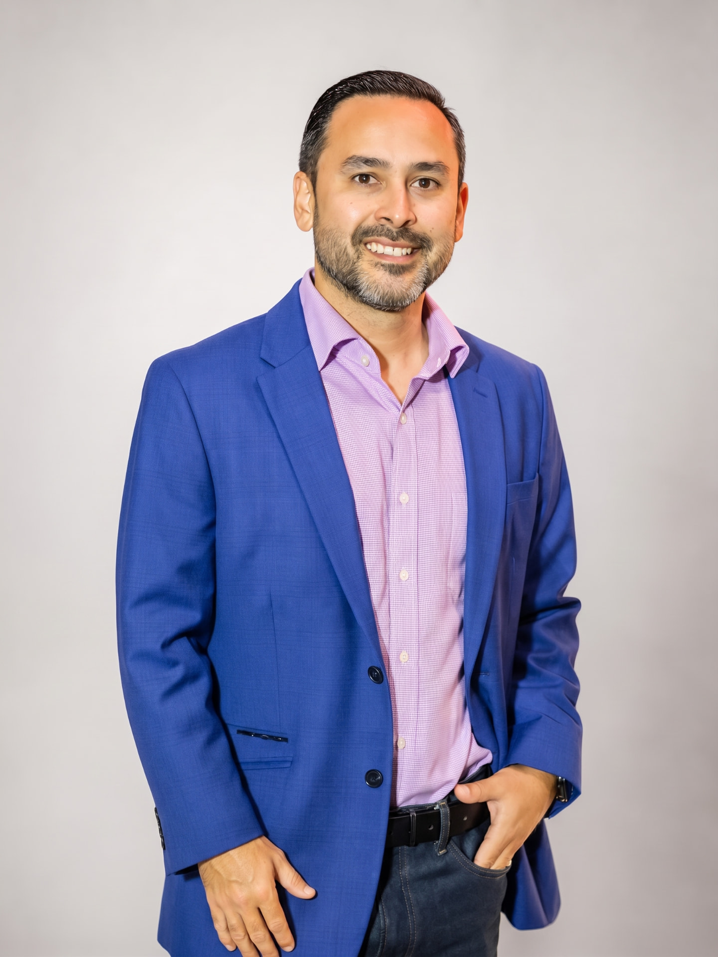 Yadi Vilato, commercial executive, in a blue blazer